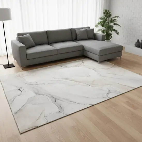 Ivory And Beige Abstract Washable Area Rug With UV Protection Photo 1