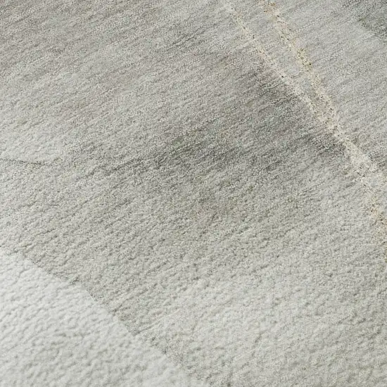 Ivory And Beige Abstract Washable Area Rug With UV Protection Photo 3