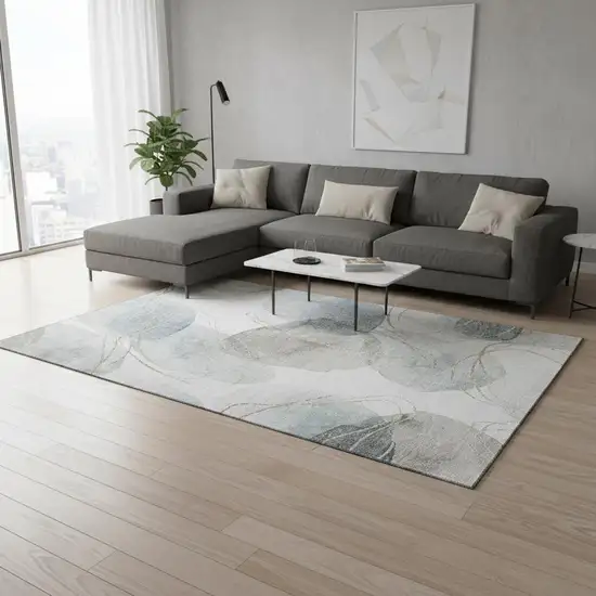 Ivory And Beige Abstract Washable Area Rug With UV Protection Photo 2