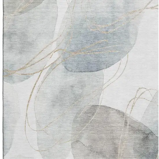 Ivory And Beige Abstract Washable Area Rug With UV Protection Photo 3
