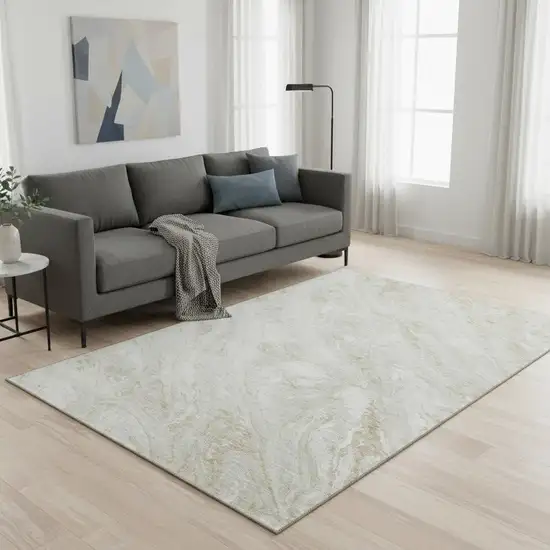 Ivory And Beige Abstract Washable Area Rug With UV Protection Photo 2
