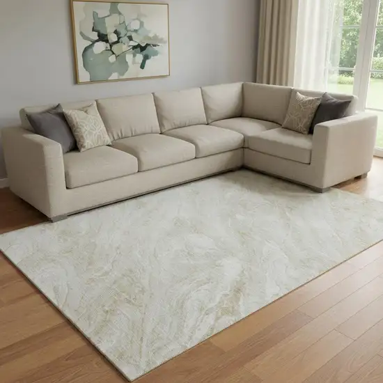 Ivory And Beige Abstract Washable Area Rug With UV Protection Photo 1