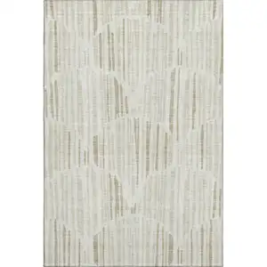 Photo of Ivory And Beige Abstract Washable Area Rug With UV Protection