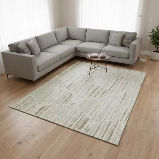 Ivory And Beige Abstract Washable Area Rug With UV Protection Photo 2