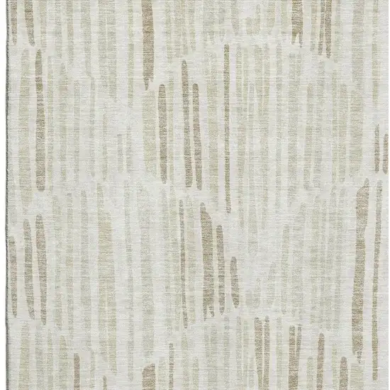 Ivory And Beige Abstract Washable Area Rug With UV Protection Photo 3