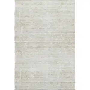 Photo of Ivory And Beige Abstract Washable Area Rug With UV Protection
