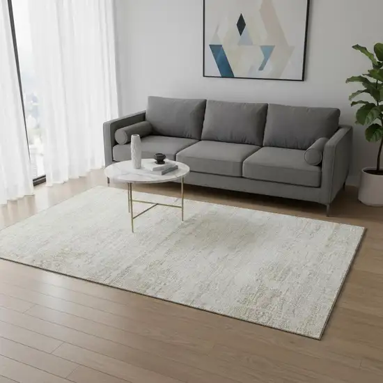 Ivory And Beige Abstract Washable Area Rug With UV Protection Photo 2