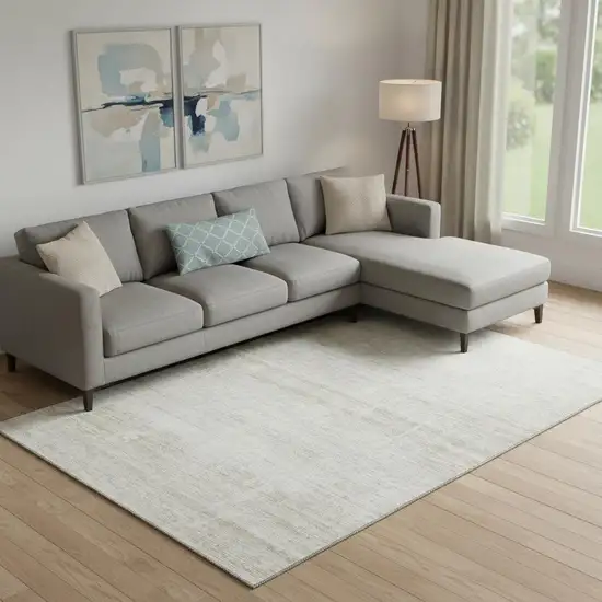 Ivory And Beige Abstract Washable Area Rug With UV Protection Photo 1