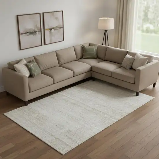 Ivory And Beige Abstract Washable Area Rug With UV Protection Photo 1