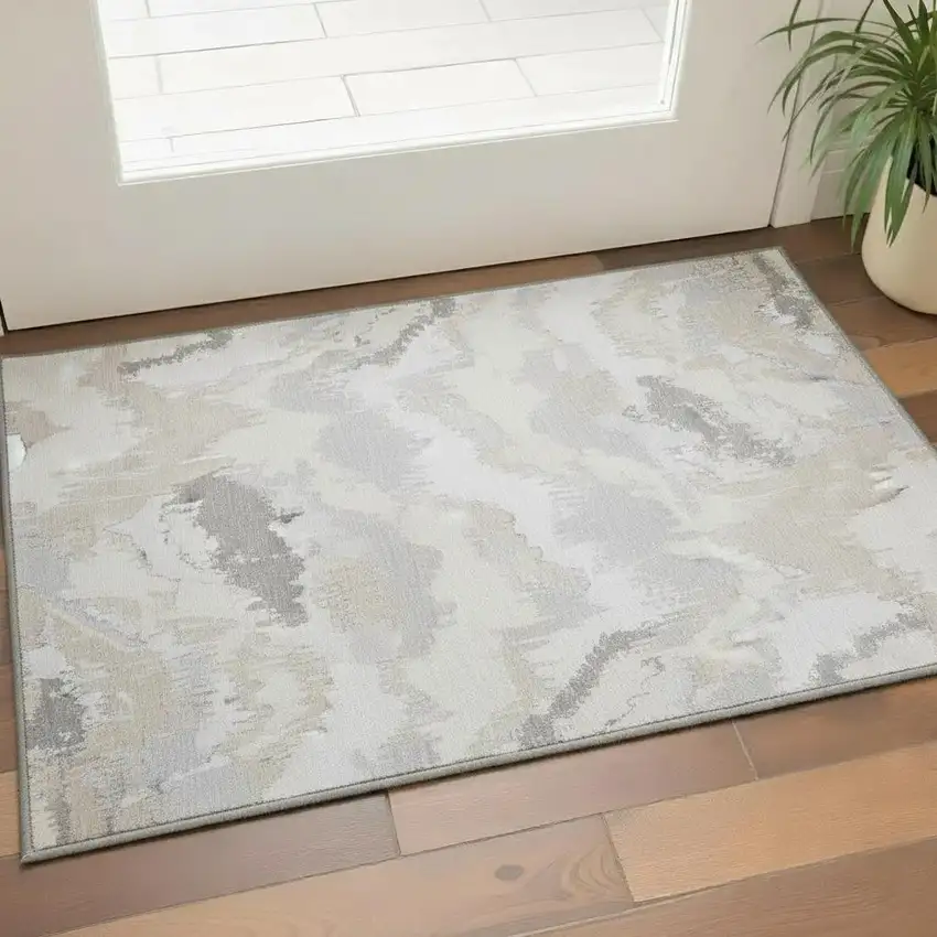 Ivory And Beige Abstract Washable Area Rug With UV Protection Photo 1