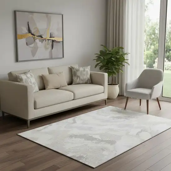 Ivory And Beige Abstract Washable Area Rug With UV Protection Photo 1