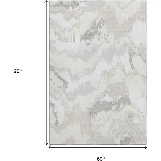 Ivory And Beige Abstract Washable Area Rug With UV Protection Photo 3