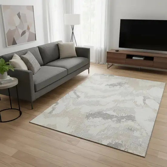 Ivory And Beige Abstract Washable Area Rug With UV Protection Photo 1