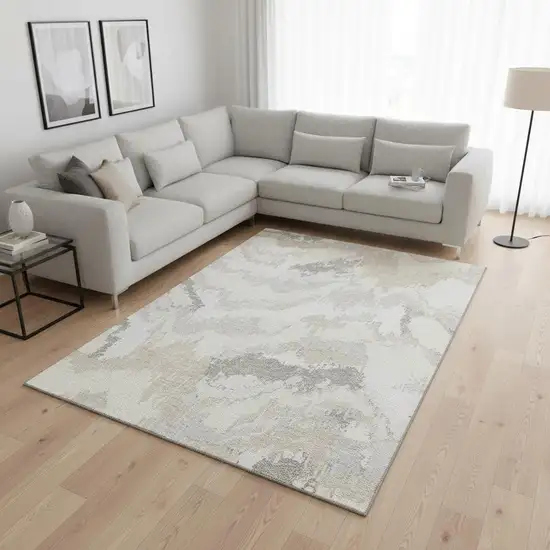 Ivory And Beige Abstract Washable Area Rug With UV Protection Photo 1