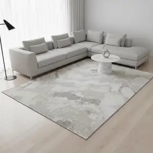 Photo of Ivory And Beige Abstract Washable Area Rug With UV Protection