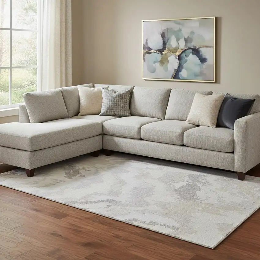 Ivory And Beige Abstract Washable Area Rug With UV Protection Photo 1