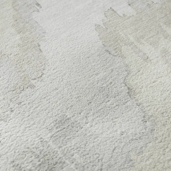 Ivory And Beige Abstract Washable Area Rug With UV Protection Photo 9