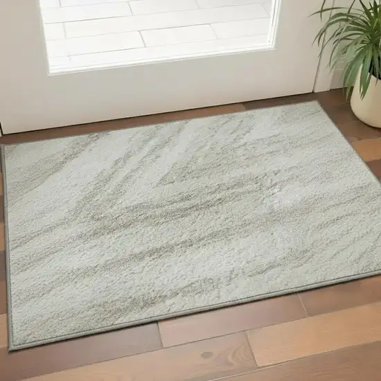 Ivory And Beige Abstract Washable Area Rug With UV Protection Photo 2