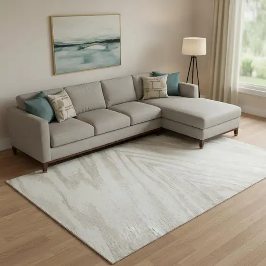 Ivory And Beige Abstract Washable Area Rug With UV Protection Photo 1