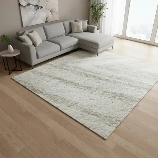 Ivory And Beige Abstract Washable Area Rug With UV Protection Photo 2