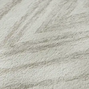 Photo of Ivory And Beige Abstract Washable Area Rug With UV Protection