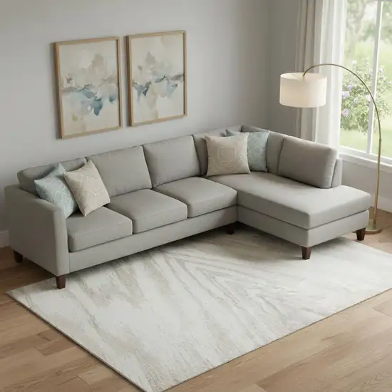 Ivory And Beige Abstract Washable Area Rug With UV Protection Photo 1