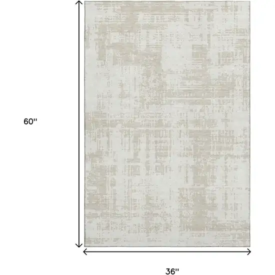 Ivory And Beige Abstract Washable Area Rug With UV Protection Photo 3