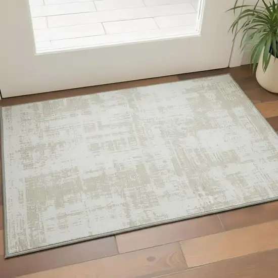 Ivory And Beige Abstract Washable Area Rug With UV Protection Photo 2