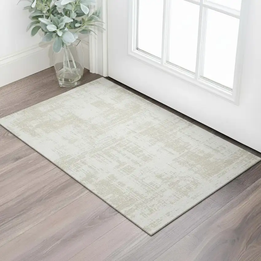 Ivory And Beige Abstract Washable Area Rug With UV Protection Photo 1