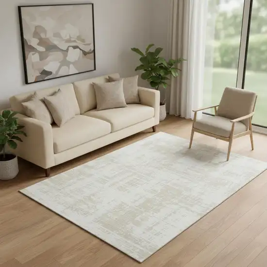 Ivory And Beige Abstract Washable Area Rug With UV Protection Photo 1