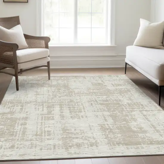 Ivory And Beige Abstract Washable Area Rug With UV Protection Photo 6