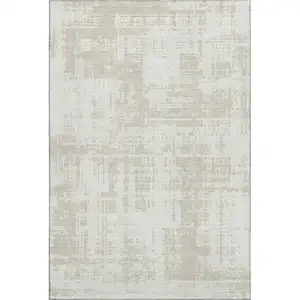 Photo of Ivory And Beige Abstract Washable Area Rug With UV Protection