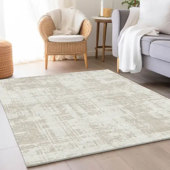 Ivory And Beige Abstract Washable Area Rug With UV Protection Photo 5