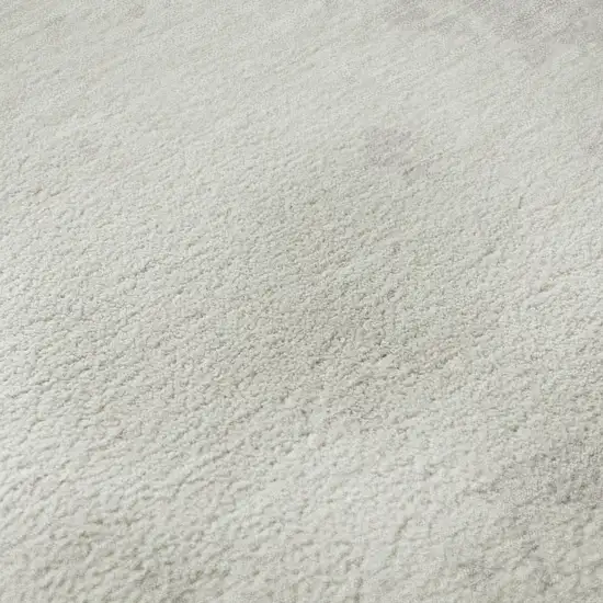 Ivory And Beige Abstract Washable Area Rug With UV Protection Photo 9