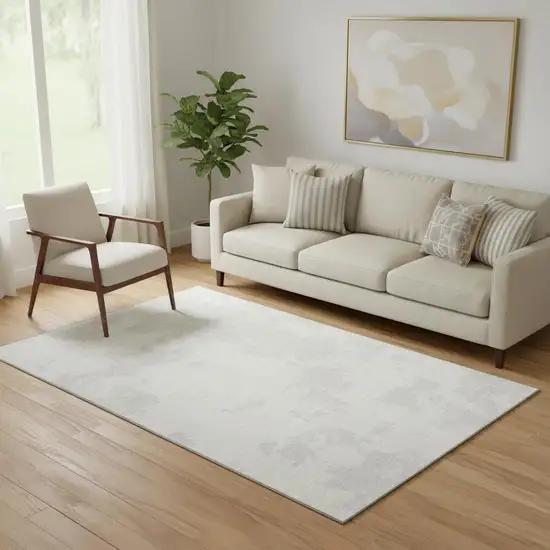 Ivory And Beige Abstract Washable Area Rug With UV Protection Photo 1