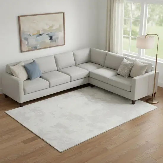 Ivory And Beige Abstract Washable Area Rug With UV Protection Photo 1