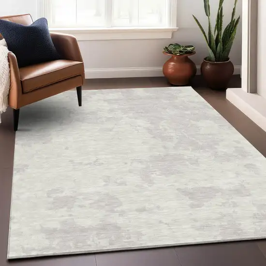 Ivory And Beige Abstract Washable Area Rug With UV Protection Photo 5