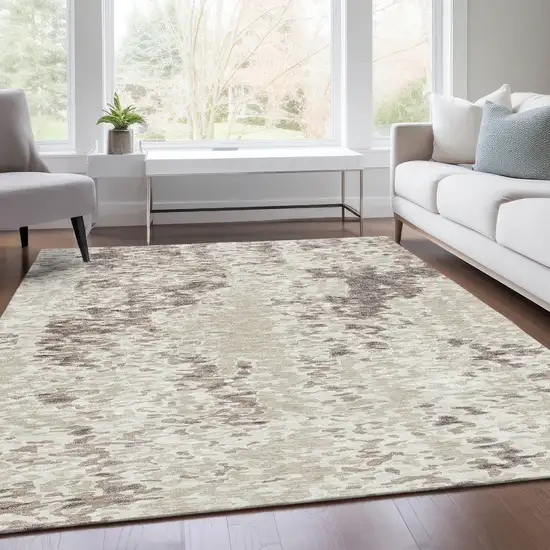 Ivory And Beige Abstract Washable Area Rug With UV Protection Photo 5