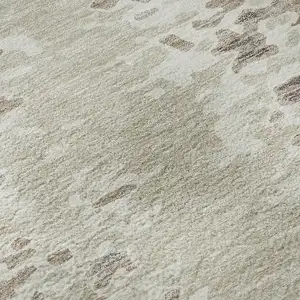 Photo of Ivory And Beige Abstract Washable Area Rug With UV Protection
