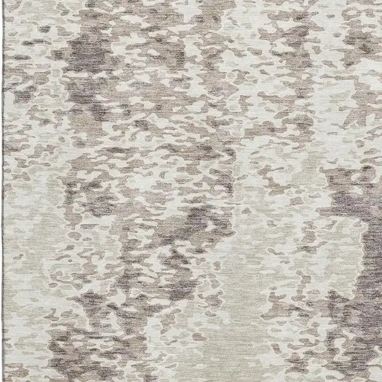 Ivory And Beige Abstract Washable Area Rug With UV Protection Photo 3