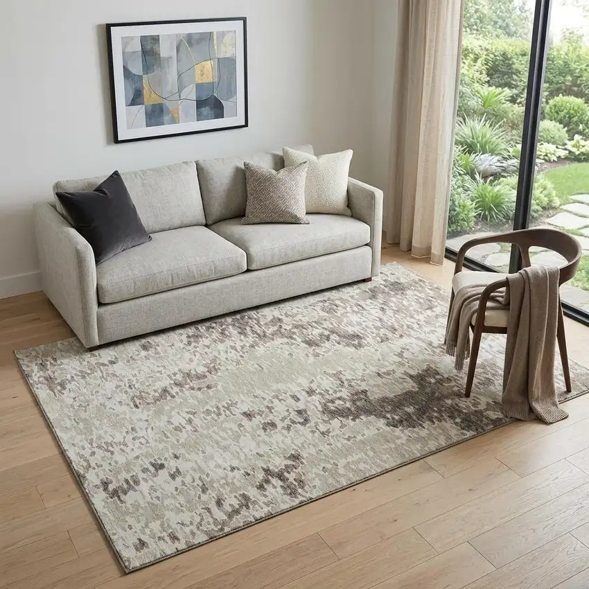 Ivory And Beige Abstract Washable Area Rug With UV Protection Photo 1