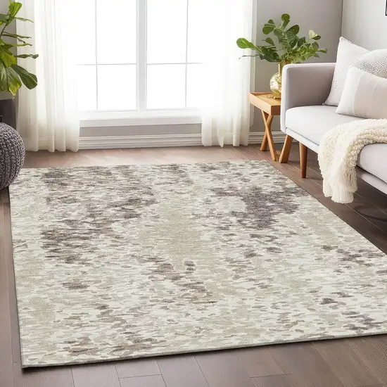 Ivory And Beige Abstract Washable Area Rug With UV Protection Photo 3