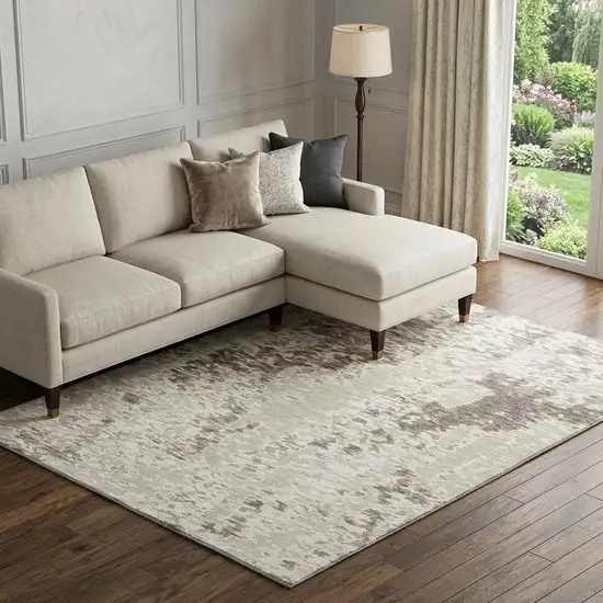 Ivory And Beige Abstract Washable Area Rug With UV Protection Photo 1