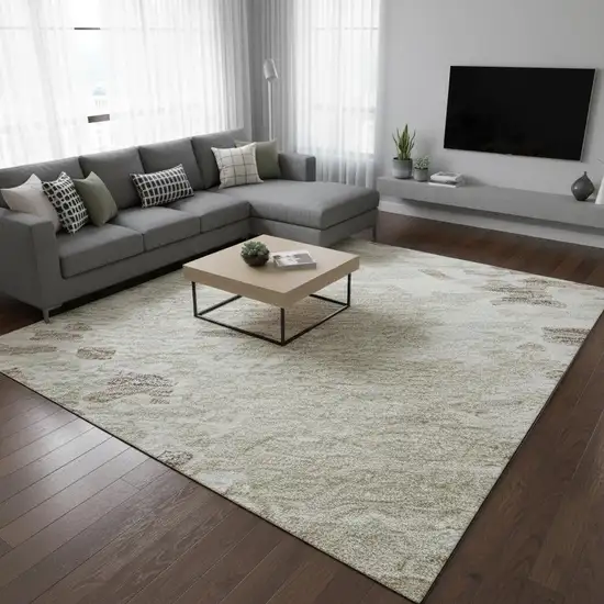 Ivory And Beige Abstract Washable Area Rug With UV Protection Photo 2