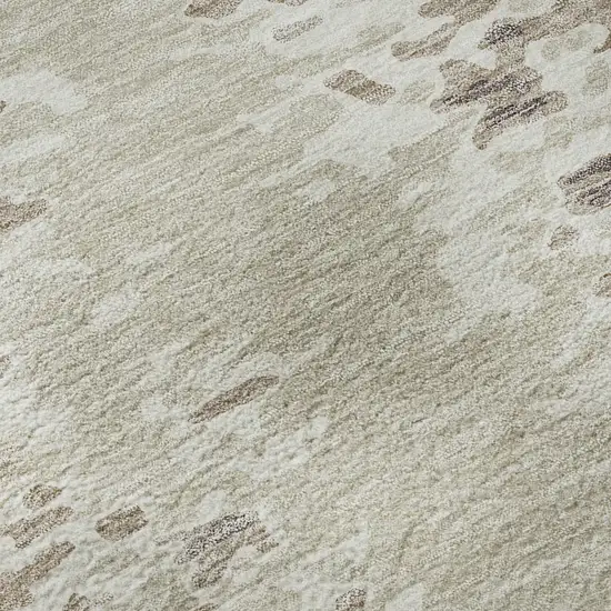 Ivory And Beige Abstract Washable Area Rug With UV Protection Photo 1