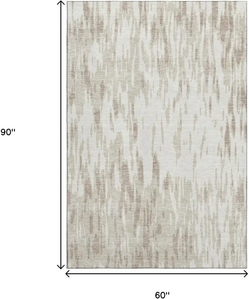 Ivory And Beige Abstract Washable Area Rug With UV Protection Photo 9