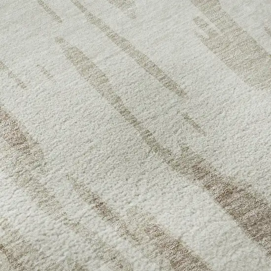 Ivory And Beige Abstract Washable Area Rug With UV Protection Photo 9