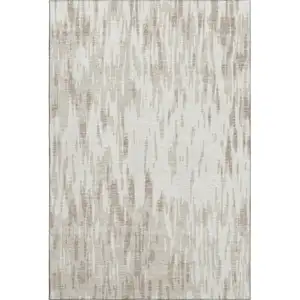 Photo of Ivory And Beige Abstract Washable Area Rug With UV Protection