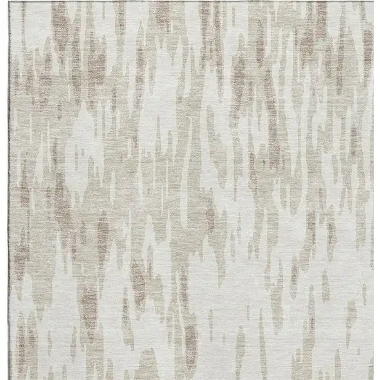 Ivory And Beige Abstract Washable Area Rug With UV Protection Photo 2