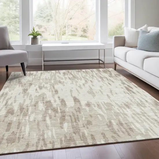 Ivory And Beige Abstract Washable Area Rug With UV Protection Photo 5